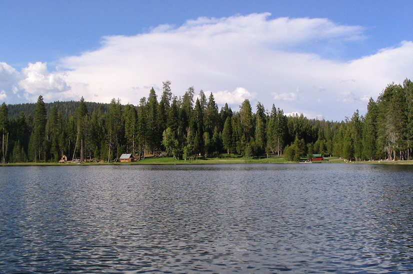 View from the dam towards lake and Smith cabins